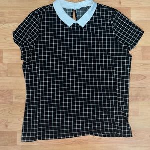 The limited black and white blouse, size large